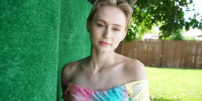 Alicia Williams Plays In The Sprinklers In A White T-Shirt