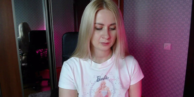 Blonde caresses her anal hole with a dildo