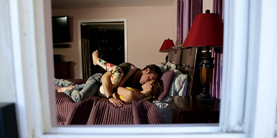 Brunette Riley Reid has sex on the bed