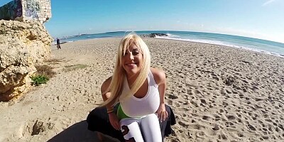Blonde babe masturbates at the beach and gives a blowjob