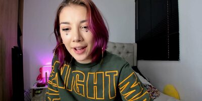 Redhead girl has very intense orgasm while fingering herself