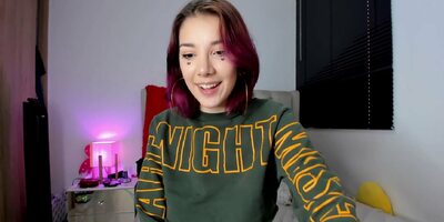 Colombian redhead with big tits tries to tempt you