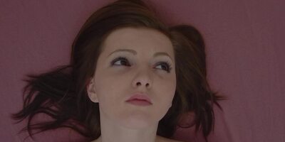 Gentle solo masturbation from a young brunette