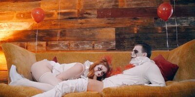 Redhead bimbo Scarlet Skies shows off her amazing cock sucking skills