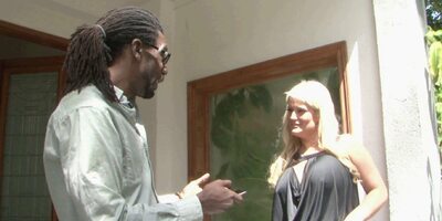 Blonde babe getting banged hard by black stud on the couch