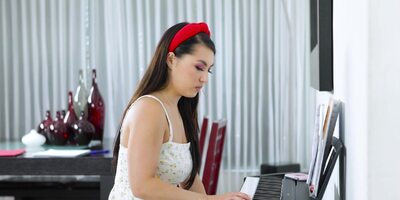 Brunette Mina Moon rides a young stallion's cock