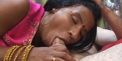 Young Indian lady gives an older man a blowjob