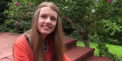 Enticing gal with cute face touches sweet pussy solo at home