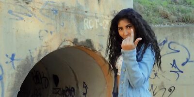 Curly-haired Latina facialized after encounter inside the pipe