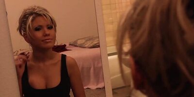 Astonishing blonde cougar is filmed while trying on different clothes