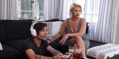 MILF with big tits in lingerie playing video games and pussy fucking with son's friend