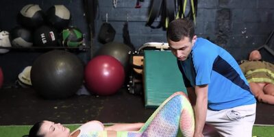 Young fitness coach fucks the divorced brunette in the gym