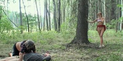 The girl looking for mushrooms sees an older lady with big