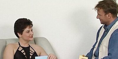 Short-haired mature woman shakes her big ass while riding a cock