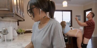 Angel Youngs sucks a massive cock and gets fucked from behind