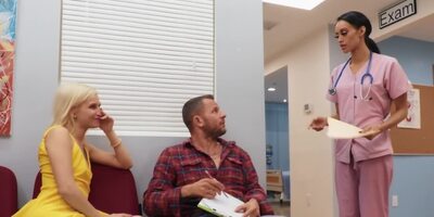 Young man reaches blonde's tight pussy in the hospital hall