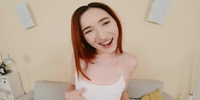 Redhead teen Angie A caresses her body in VR