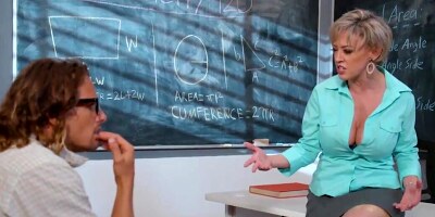 Big-tittied teacher motivates negligent stud with sex