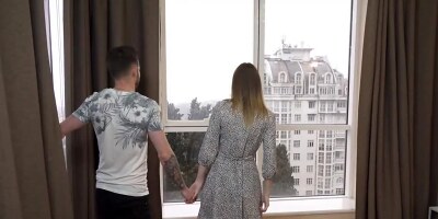 Charming girl and a horny fellow are fucking in the hotel room
