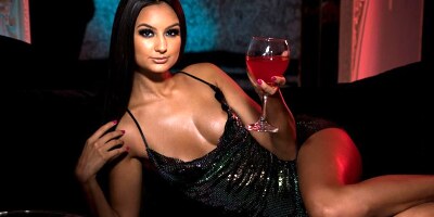 Glamorous brunette strips in a solo and masturbates