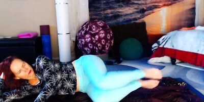 Redheaded amateur chick is doing yoga in front of the cam