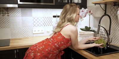 Luscious blonde Sophie in solo masturbation in the kitchen