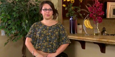 Nerdy housewife rubs hairy pussy in the kitchen