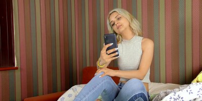 Petite Jenny Wilson gets naked and fucks her pussy in the bedroom