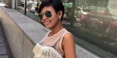 Thai woman with short hair is riding on a big schlong