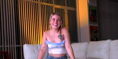 Busty blonde is looking at you while riding in point of view