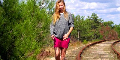 Solo masturbation from busty Elison on railroad tracks