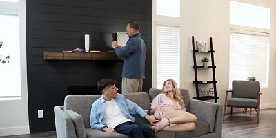 She is trying not to moan while riding his huge dong