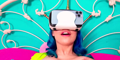 She is playing with the VR before experiencing reality