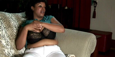 Ebony MILF with massive boobs teasing her wet muff