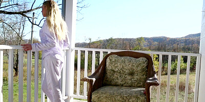 Lusty coed Kali Renee is using a hard dildo to help enjoy her outdoor indulgence