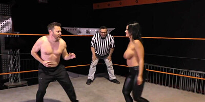 Nadia White wrestling with Glenn King in a fetish clip