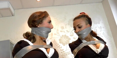 gina and ruby taped up in chair