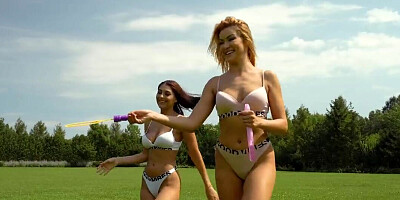 Outdoors kissing and licking for a pair of lesbian chicks