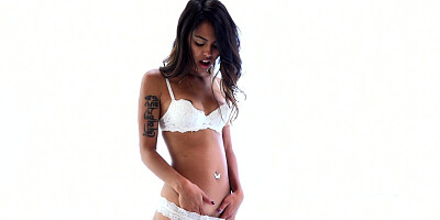 Petite Latina Lindsey Woods fucks herself with a dildo