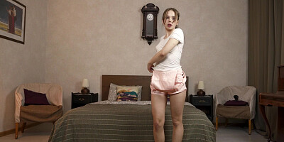Petite Bouncing Betty caresses her naked body in the bedroom