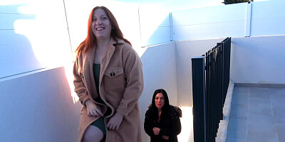 Chubby redhead and her dyke friend working on a dick