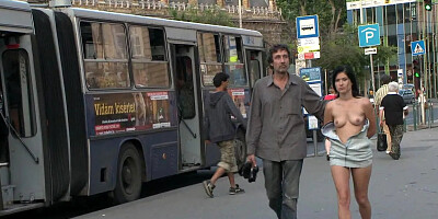 Submissive brunette gets paraded through the city centre before getting face fucked