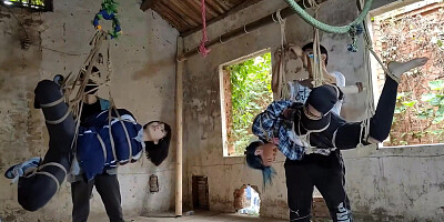 Two Girls Suspended In An Abandoned House