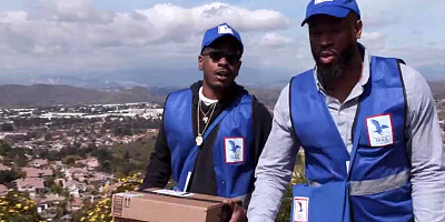 Sophia Locke sucking on a couple of stiff black dongs