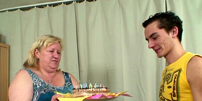 Limp dick of a skinny lad is sucked by a blonde GILF