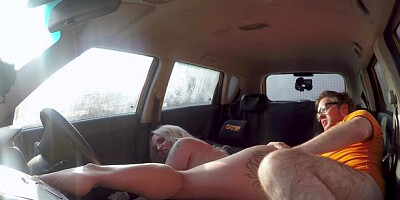 Fake Driving School - Louise Lee alongside Ryan Ryder in a car