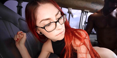 Nerdy redhead girl sucks a black cock and enjoys fucking