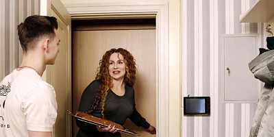 MILF Tanya Foxxx is approached in the kitchen by a teen