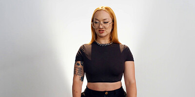 Redhead cougar gets naked and plays with wet pussy