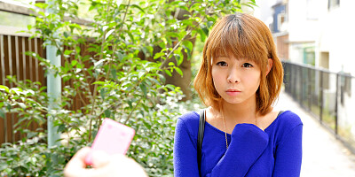 A couple of strangers are confronting Fu Sazanami outdoor